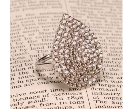 A 9ct white gold pear shaped diamond cocktail ring, round brilliant cut diamonds totalling 3.15ct, size M
