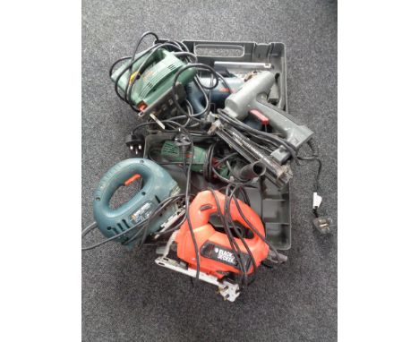 A box containing assorted power tools to include cased Bosch jigsaw, Bosch angle grinder, etc 