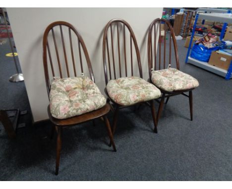 A set of three ercol solid beech high back dining chairs in an antique finish 