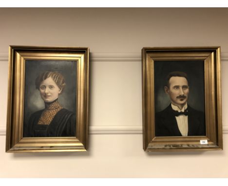 A paIr of over painted prints depicting portraits of a man and a woman , both parts framed (2)