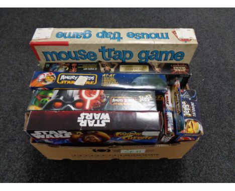 A box containing Star Wars Episode One 3D adventure game, Star Wars Angry Birds, vintage Mouse Trap etc 