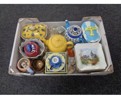 A box containing miscellaneous china to include novelty teapots, continental dishes depicting birds, Royal Worcester egg codd