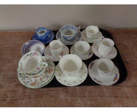 A tray containing 20th century coffee cans, teacups and saucers, to include Royal Worcester, Wedgwood, Minton, Copeland Spode
