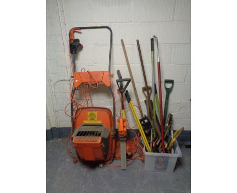 A Flymo hover back HV4000, with a Flymo strimmer and box of a large quantity of assorted garden tools 