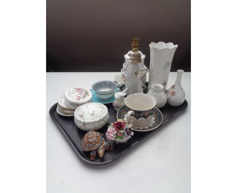 A tray containing assorted china to include Nao figure of a girl 'Aynsley', table lamp and vase, lidded trinket dishes, Wedgw