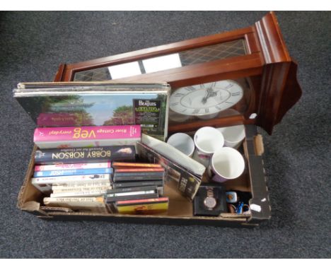 A box of London Clock Company Westminster wall clock, vinyl records - The Beatles, mugs, watch, CD's, Beatrix Potter books et
