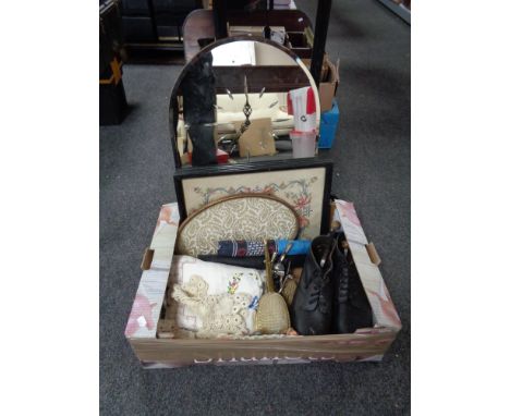 A box containing a pair of vintage leather boots with stretchers, table linen, dressing table brush set, frameless archtop mi