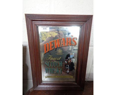 A framed Dewars Finest Scotch Whiskey advertising mirror 