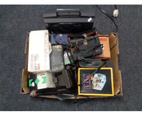 A box containing cameras and photographic equipment, projector and screen 