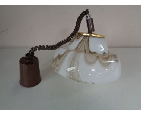 A twentieth century opaque glass light fitting.Provenance : This light fitting was recently removed from an apartment in the 