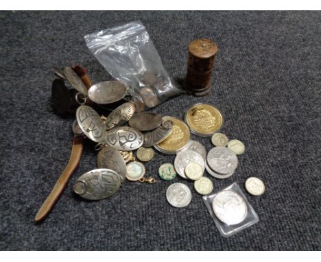 A crate containing commemorative coins and other coins, wrist watch, panel necklace, antique gaming storage container etc. 