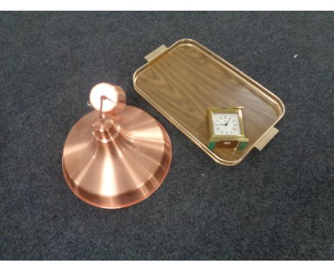 A gilt twin handled serving tray together with a contemporary copper pendant light fitting and a brass battery operated carri