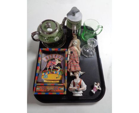 A tray containing a vintage musical circus dancing clown, a commemorative green glass tankard, 2 china dolly tops together wi