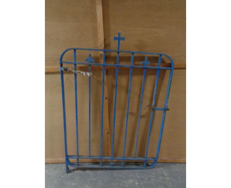 A wrought iron ecclesiastical gate  