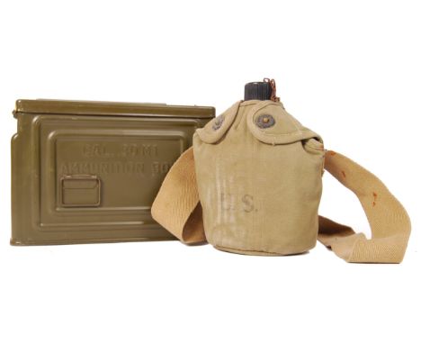 A WWII Second World War military water flask / canteen bottle within the canvas holder with strap. Along with a khaki green '