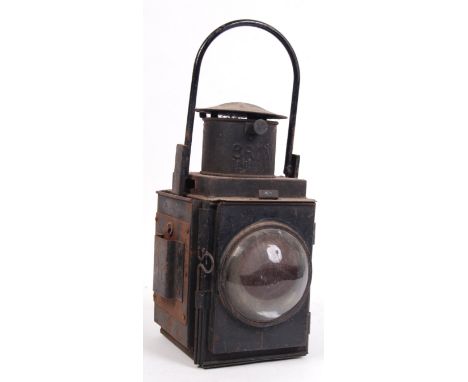 An original vintage British Rail Railwayman's lamp. Twin glass lenses and carry handle to top. Complete with drop-in red glas