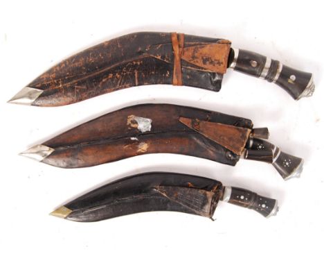 A collection of 3x&nbsp;early to mid 20th century Middle Eastern Kukri knives with lion mask pommels of graduating sizes all 