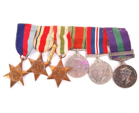 An original WWII Second World War medal group comprising: War Medal, Defense Medal, Italy Star, Africa Star with 8th Army bar