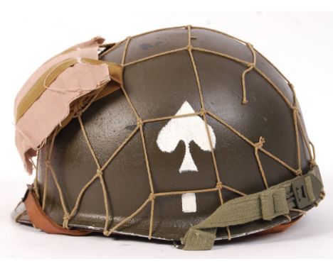 A rare WWII Second World War US Army issue ' 101st Airborne ' division uniform steel MC1 helmet. Fully complete, including th