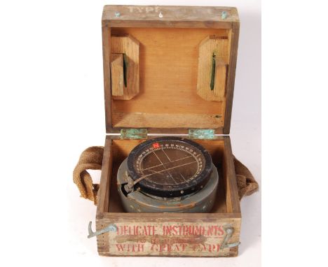 A rare original WWII Second World War Air Ministry issued Spitfire Pilot's compass. The compass mounted within a metal case. 