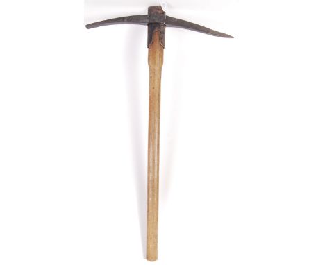 An original WWII Second World War British made large pick axe, with removable head. With indecipherable makers mark &amp; ' 1