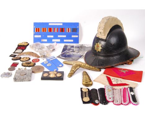 Personal effects of a British Fire Services fireman formerly within the London , Weymouth and Somerset Brigades to include; F