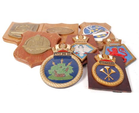 A collection of 8x assorted vintage Military, US ships, submarines and British regimental crest plaques. To include; Theodore