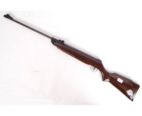 A vintage unnamed .22 calibre break barrel air rifle. Wooden stock, with adjustable sight. No makers marks, possibly West Lak