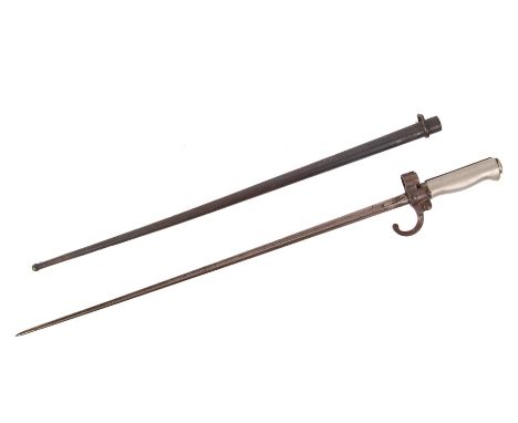 An antique 19th century French 1886 pattern Lebel cruciform rifle bayonet. Cruciform fullered blades, within its original ste