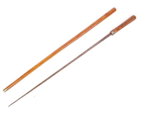 An antique late 19th / early 20th century Victorian malacca shaft sword stick / walking cane. With a silver hallmarked band t