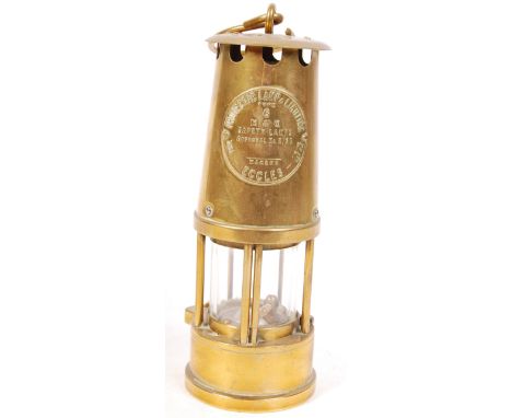 A mid 20th century brass Eccles miners lamp embossed 'Protector Lamp &amp; Lighting type 6 M &amp; Q Safety Lamps', with hand