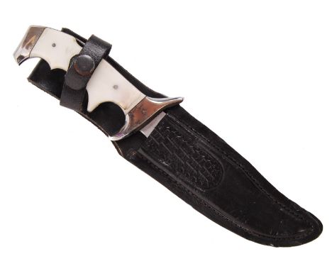 A 20th century contemporary hunting knife and leather scabbard. The blade having ' Ravi ' on the blade with a faux mother of 