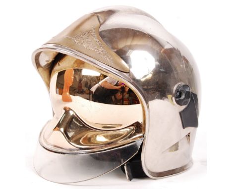 A rare vintage French ' Sapeurs Pompiers ' Fireman's / Fire Fighter's helmet. Silvered plastic construction, with silvered pu