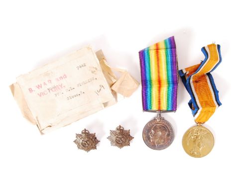 An original WWI First World War medal pair ( War &amp; Victory Medal ) awarded to a 3066 Private H. L. Fielding of the Glouce