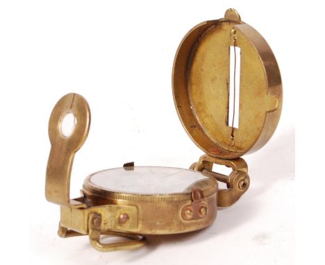 A vintage brass cased Stanley of London ' Engineer Compass '. The opening compass with sight hole and adjustable sight. Stamp
