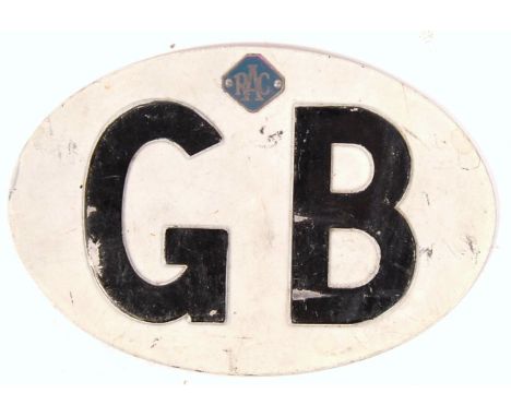 An original vintage mid-century RAC issued enamel / pressed steel car plate sign ' GB '. White, with raised black lettering. 