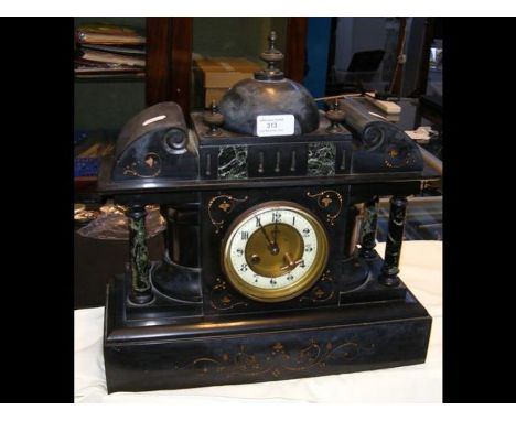 A Victorian slate and marble mantel clock 