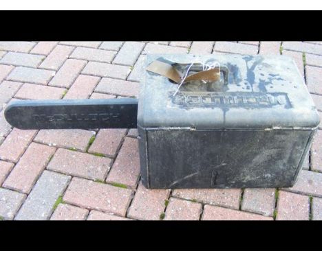 A McCulloch 444 Petrol Chainsaw in case 