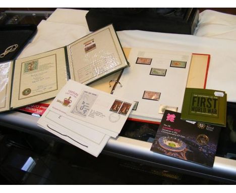 A stamp album together with First Day Covers, collectable locomotive stamp etc.