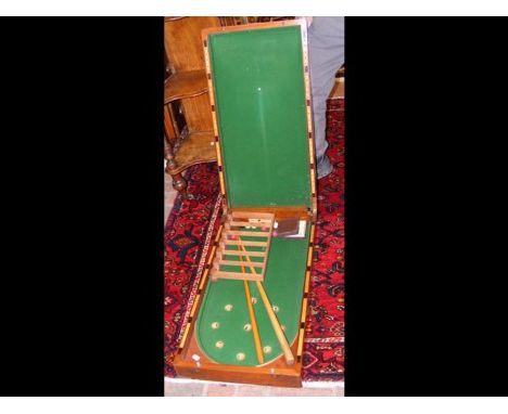 A bagatelle table retailed by Jones &amp; Son, Leamington Spa