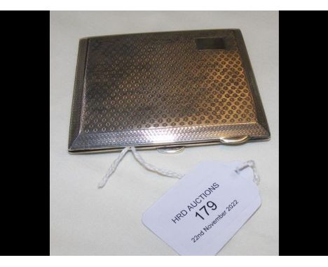 An engine turned silver cigarette case 