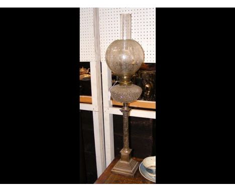 A late 19th century silver Corinthian column oil lamp with cut glass reservoir, Hinks No. 2 burner - maker Cooper Bros, Sheff
