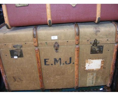 A cloth bound vintage luggage trunk