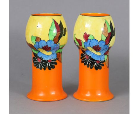 A pair of Wilkinson pottery ‘Indian Summer’ pattern vases with bulbous necks, boldly painted in bright enamels with stylised 