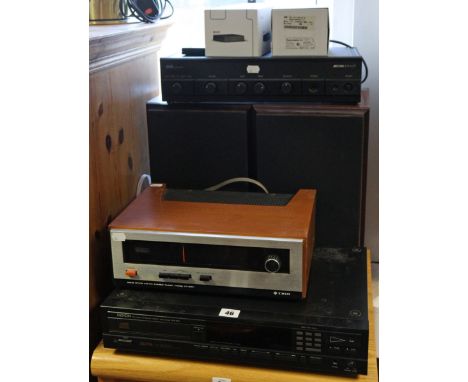 A Denon CD player with a remote control; an A &amp; R “Arcam” stereo amplifier; a Solid State stereo tuner; &amp; a pair of S