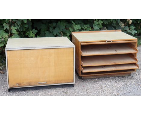 Two light grey laminate plan/artist’s chests (one fitted four sliding trays, the other three sliding trays) both 36” wide x 2