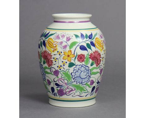 A large Poole Pottery baluster vase painted with flowers in coloured enamels by Gwen Haskins (pattern BN), impressed mark “PO