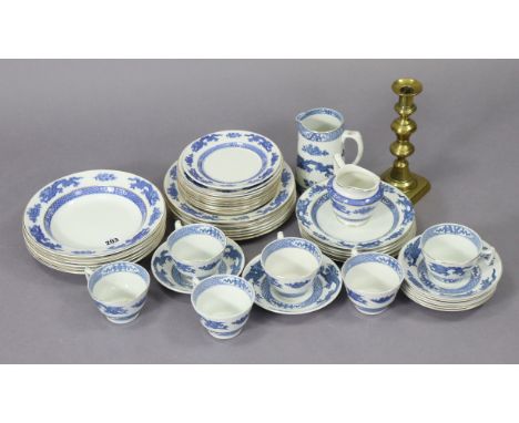 A forty-five piece matched blue &amp; white “Dragon Crescent" dinner &amp; tea service; &amp; a brass candlestick.&nbsp;