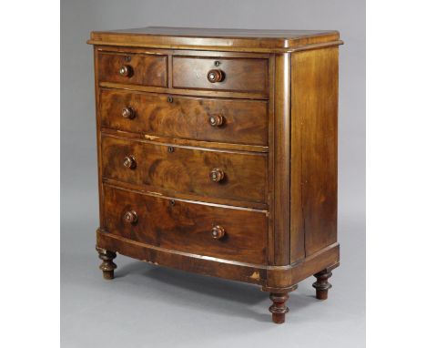 A Victorian mahogany large bow-front chest with moulded edge to the rectangular top, fitted two short &amp; three long gradua