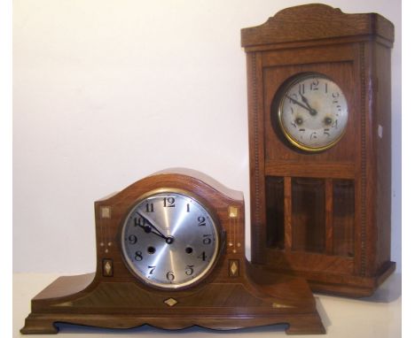 An Art Deco Mantle Clock with steel dial in inlaid mahogany case, 10" (26cms) high (movement replaced), and a 1920's German W
